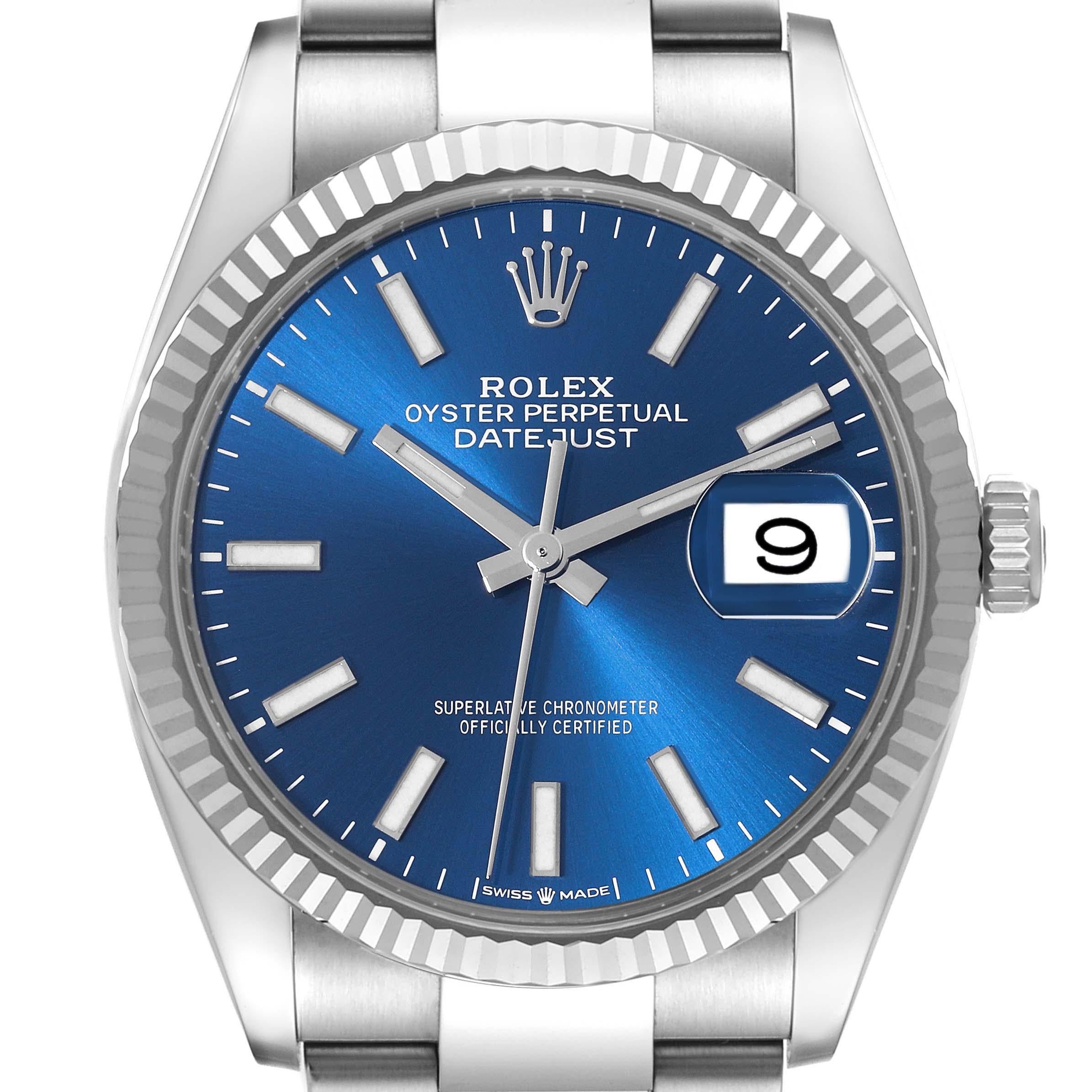 Rolex Datejust Steel White Gold Blue Dial Mens Watch 126234 Box Card. Officially certified chronometer self-winding movement. Stainless steel case 36.0 mm in diameter.  Rolex logo on a crown. 18K white gold fluted bezel. Scratch resistant sapphire