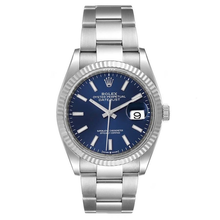 Rolex Datejust Steel White Gold Blue Dial Mens Watch 126234. Officially certified chronometer self-winding movement. Stainless steel case 36.0 mm in diameter.  Rolex logo on a crown. 18K white gold fluted bezel. Scratch resistant sapphire crystal