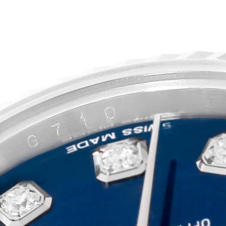 Rolex Datejust Steel White Gold Blue Diamond Dial Ladies Watch 179174. Mouvement automatique à remontage automatique, officiellement certifié chronomètre. Boîtier oyster en acier inoxydable de 26.0 mm de diamètre. Logo Rolex sur la couronne. Lunette