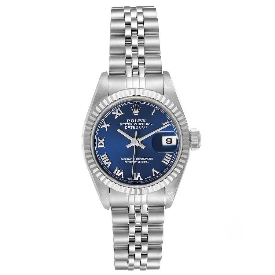 Rolex Datejust Steel White Gold Blue Roman Dial Ladies Watch 69174. Officially certified chronometer self-winding movement. Stainless steel oyster case 26.0 mm in diameter. Rolex logo on a crown. 18k white gold fluted bezel. Scratch resistant