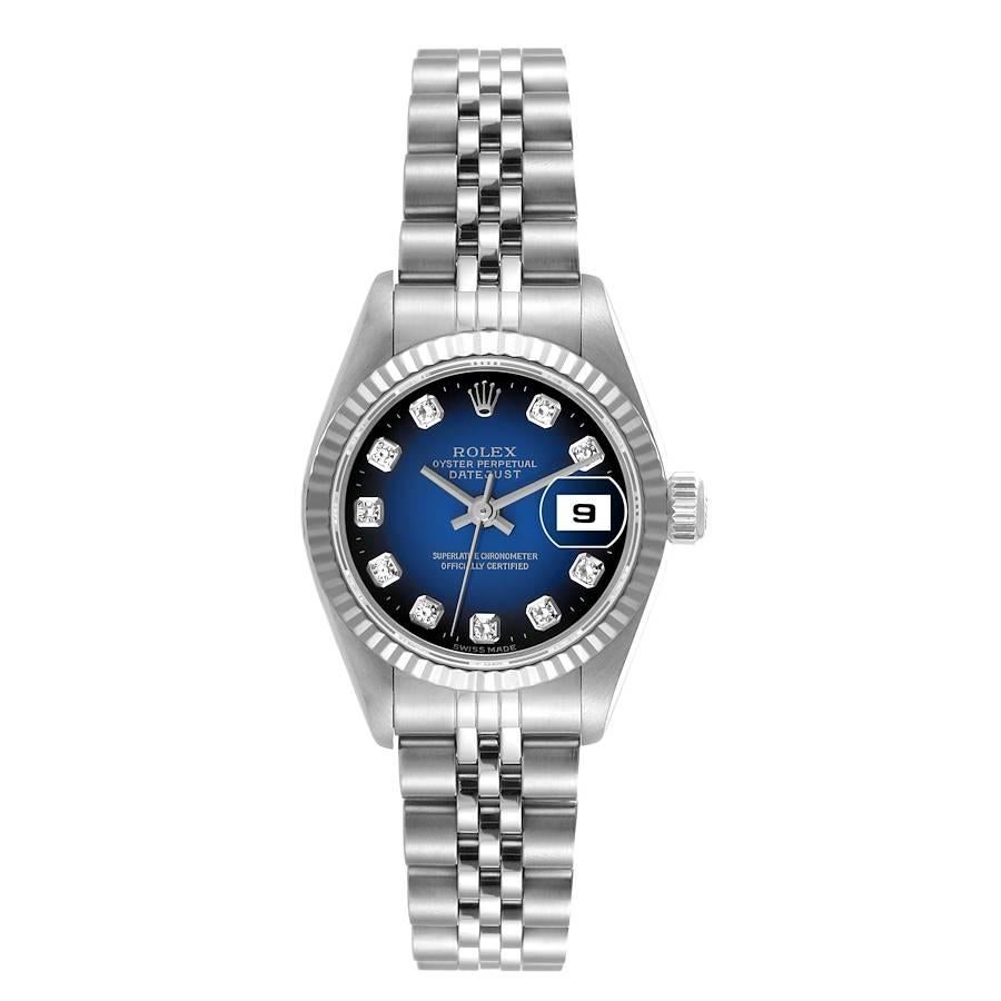 Rolex Datejust Steel White Gold Blue Vignette Diamond Ladies Watch 69174. Officially certified chronometer self-winding movement. Stainless steel oyster case 26.0 mm in diameter. Rolex logo on a crown. 18k white gold fluted bezel. Scratch resistant