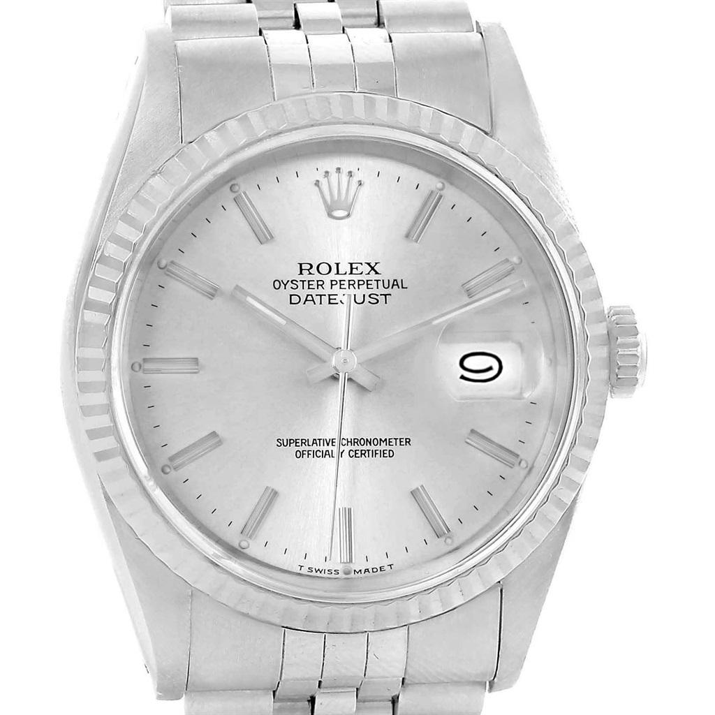 Rolex Datejust Steel White Gold Fluted Bezel Mens Watch 16234. Officially certified chronometer self-winding movement with quickset date function. Stainless steel oyster case 36 mm in diameter. Rolex logo on a crown. 18k white gold fluted bezel.