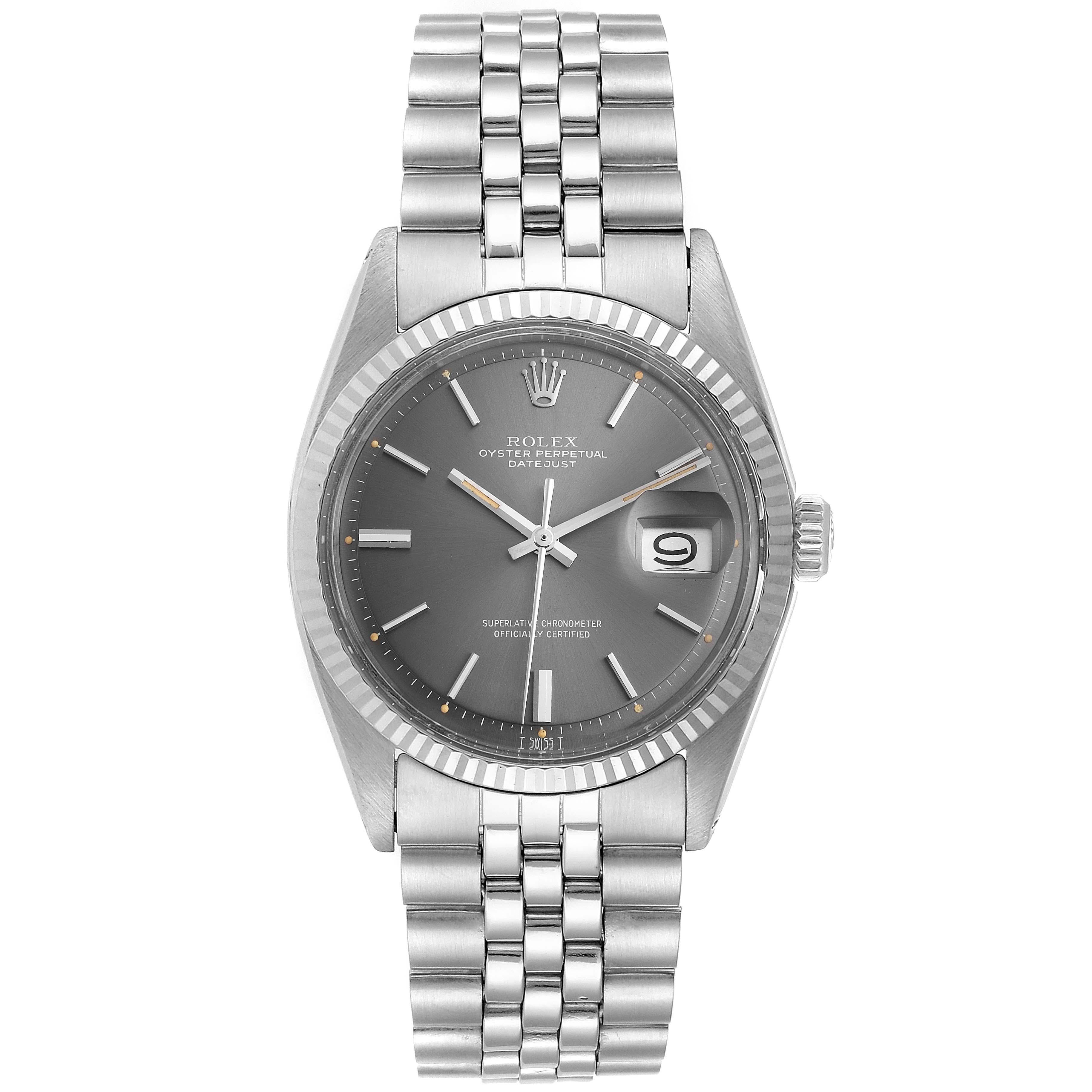 Rolex Datejust Steel White Gold Grey Dial Vintage Steel Watch 1601. Officially certified chronometer self-winding movement. Stainless steel oyster case 36 mm in diameter. Rolex logo on a crown. 18k white gold fluted bezel. Acrylic crystal with