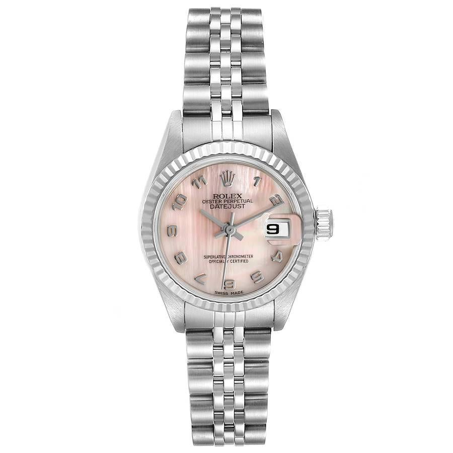 Rolex Datejust Steel White Gold MOP Dial Ladies Watch 79174. Officially certified chronometer self-winding movement. Stainless steel oyster case 26.0 mm in diameter. Rolex logo on a crown. . Scratch resistant sapphire crystal with cyclops magnifier.