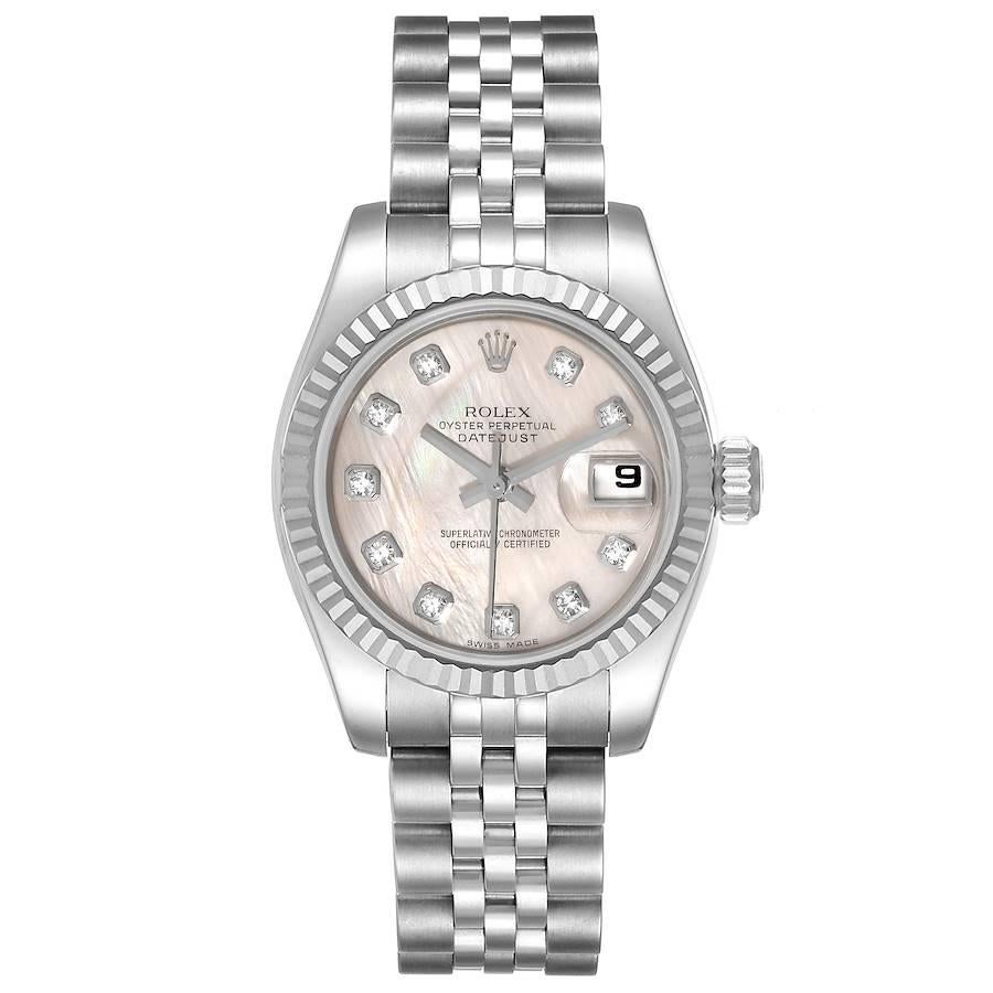 Rolex Datejust Steel White Gold MOP Diamond Ladies Watch 179174. Officially certified chronometer self-winding movement. Stainless steel oyster case 26.0 mm in diameter. Rolex logo on a crown. 18K white gold fluted bezel. Scratch resistant sapphire
