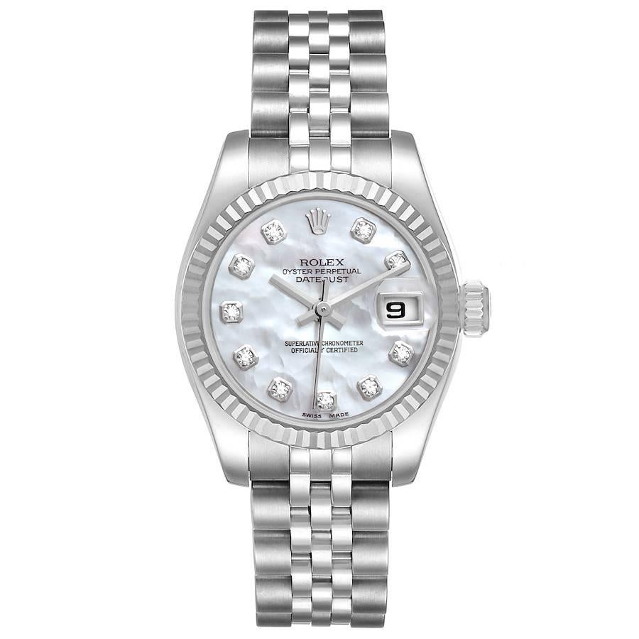 Rolex Datejust Steel White Gold MOP Diamond Ladies Watch 179174. Officially certified chronometer self-winding movement. Stainless steel oyster case 26.0 mm in diameter. Rolex logo on a crown. 18K white gold fluted bezel. Scratch resistant sapphire