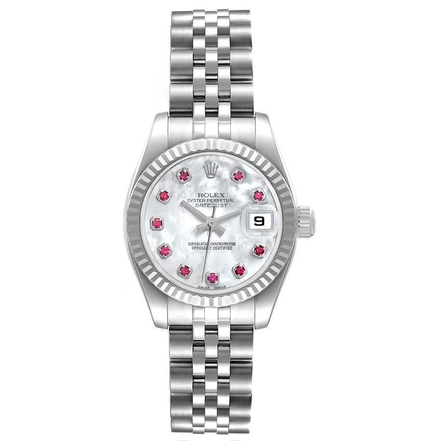Rolex Datejust Steel White Gold MOP Ruby Dial Ladies Watch 179174 Box Card. Officially certified chronometer self-winding movement. Stainless steel oyster case 26.0 mm in diameter. Rolex logo on the crown. 18K white gold fluted bezel. Scratch