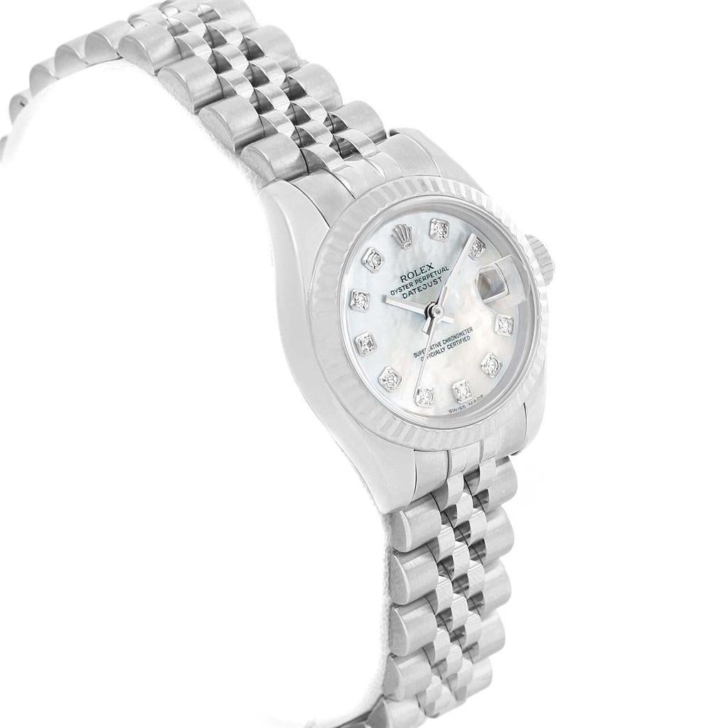 Rolex Datejust Steel White Gold MOP Diamond Dial Ladies Watch 179174. Officially certified chronometer automatic self-winding movement. Stainless steel oyster case 26.0 mm in diameter. Rolex logo on a crown. 18K white gold fluted bezel. Scratch