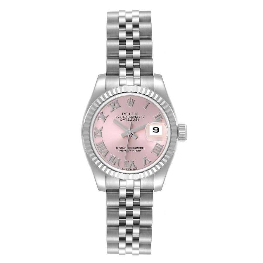 Rolex Datejust Steel White Gold Pink Roman Dial Ladies Watch 179174 Box Card. Officially certified chronometer automatic self-winding movement. Stainless steel oyster case 26.0 mm in diameter. Rolex logo on the crown. 18K white gold fluted bezel.