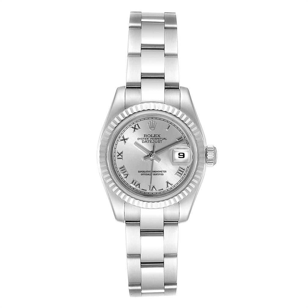 Rolex Datejust Steel White Gold Rhodium Roman Dial Ladies Watch 179174. Officially certified chronometer self-winding movement. Stainless steel oyster case 26.0 mm in diameter. Rolex logo on a crown. 18K white gold fluted bezel. Scratch resistant