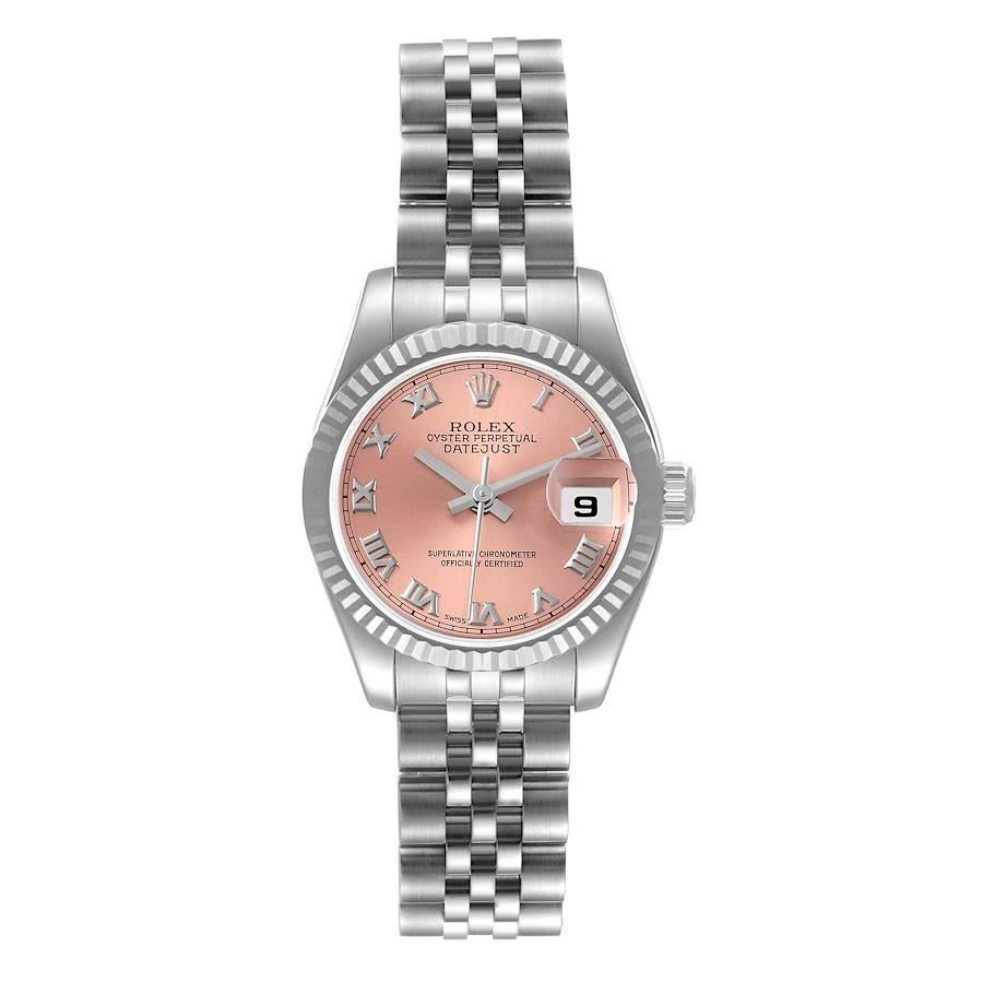 Rolex Datejust Steel White Gold Salmon Dial Ladies Watch 179174. Officially certified chronometer self-winding movement. Stainless steel oyster case 26.0 mm in diameter. Rolex logo on a crown. 18K white gold fluted bezel. Scratch resistant sapphire