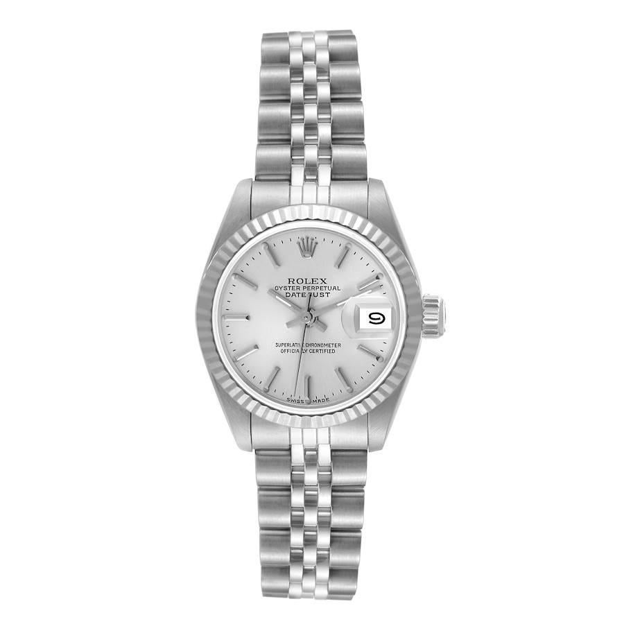 Rolex Datejust Steel White Gold Silver Dial Ladies Watch 69174. Officially certified chronometer self-winding movement. Stainless steel oyster case 26 mm in diameter. Rolex logo on a crown. 18k white gold fluted bezel. Scratch resistant sapphire