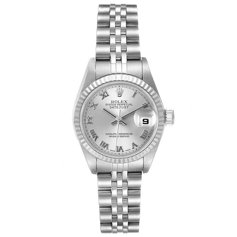 Rolex Datejust Steel White Gold Silver Dial Ladies Watch 79174. Officially certified chronometer self-winding movement. Stainless steel oyster case 26.0 mm in diameter. Rolex logo on a crown. 18K white gold fluted bezel. Scratch resistant sapphire
