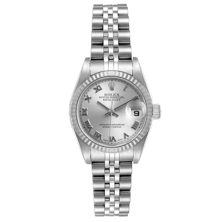 Rolex Datejust Steel White Gold Silver Dial Ladies Watch 79174. Officially certified chronometer self-winding movement. Stainless steel oyster case 26.0 mm in diameter. Rolex logo on a crown. 18k white gold fluted bezel. Scratch resistant sapphire