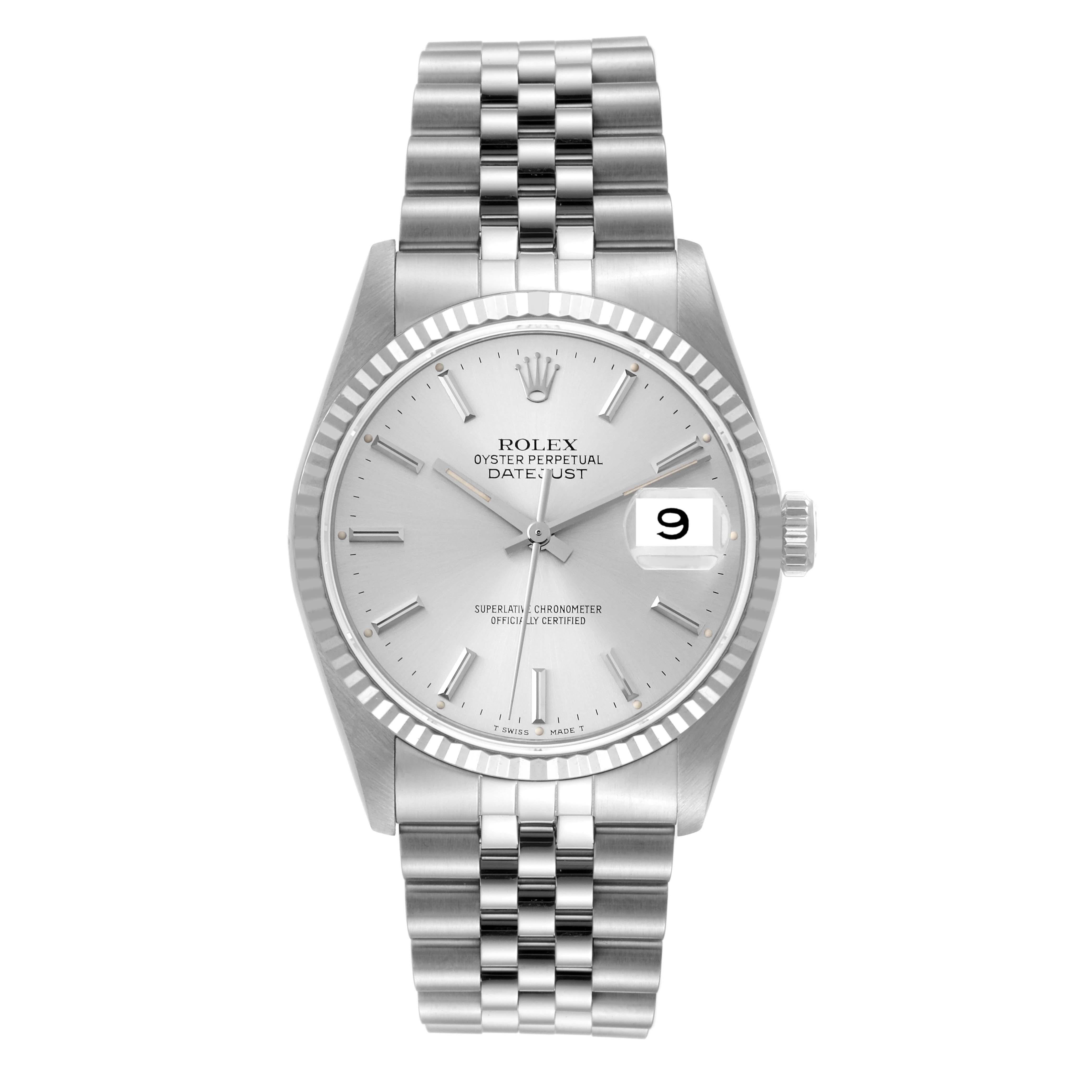 Rolex Datejust Steel White Gold Silver Dial Mens Watch 16234. Officially certified chronometer automatic self-winding movement. Stainless steel oyster case 36 mm in diameter. Rolex logo on the crown. 18k white gold fluted bezel. Scratch resistant
