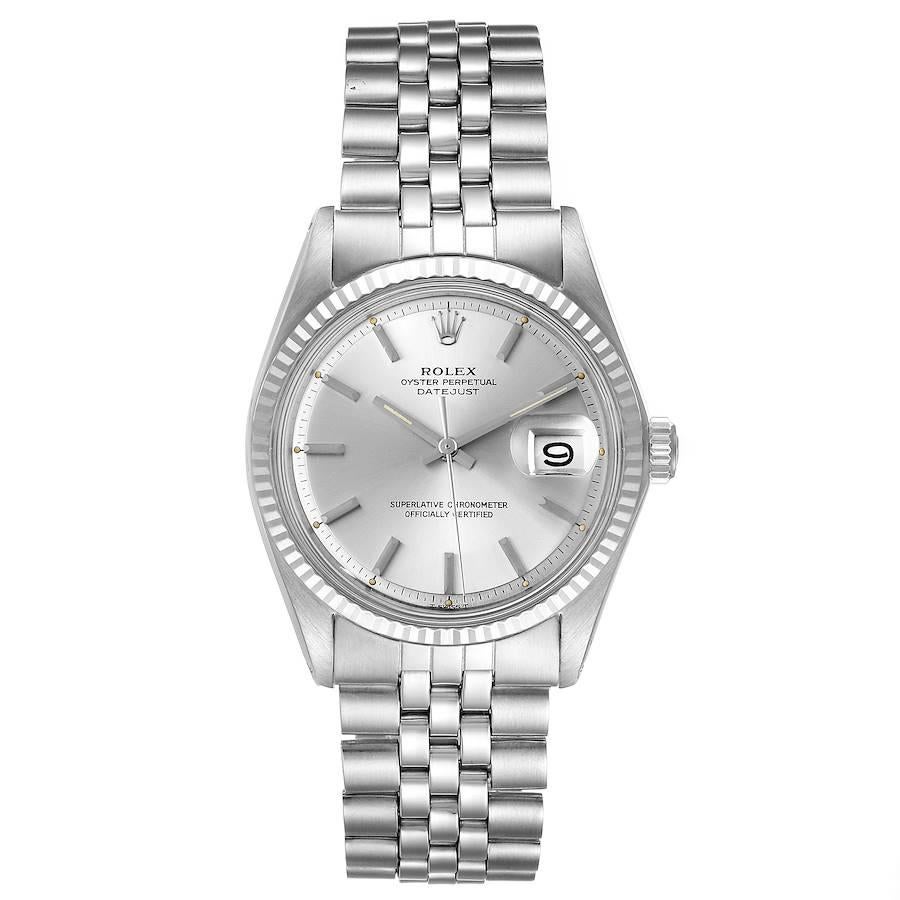 Rolex Datejust Steel White Gold Silver Dial Vintage Mens Watch 1601. Officially certified chronometer self-winding movement. Stainless steel oyster case 36 mm in diameter. Rolex logo on a crown. 18k white gold fluted bezel. Acrylic crystal with