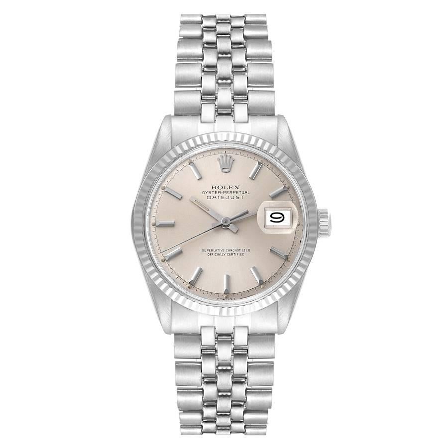 Rolex Datejust Steel White Gold Silver Dial Vintage Mens Watch 1601. Officially certified chronometer automatic self-winding movement. Stainless steel oyster case 36 mm in diameter. Rolex logo on the crown. 18k white gold fluted bezel. Acrylic