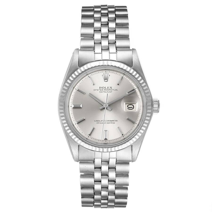 Rolex Datejust Steel White Gold Silver Dial Vintage Mens Watch 1601 Papers. Officially certified chronometer self-winding movement. Stainless steel oyster case 36 mm in diameter. Rolex logo on a crown. 18k white gold fluted bezel. Acrylic crystal