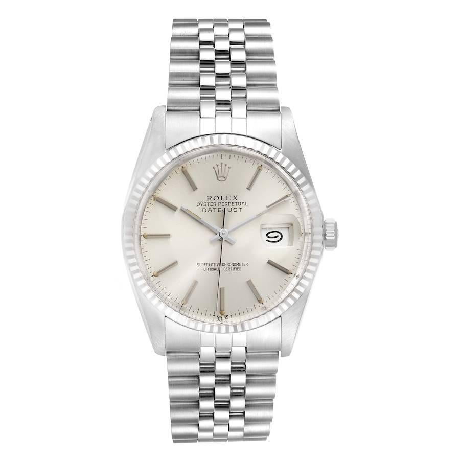 Rolex Datejust Steel White Gold Silver Dial Vintage Mens Watch 16014. Officially certified chronometer self-winding movement. Stainless steel oyster case 36 mm in diameter. Rolex logo on a crown. 18k white gold fluted bezel. Acrylic crystal with