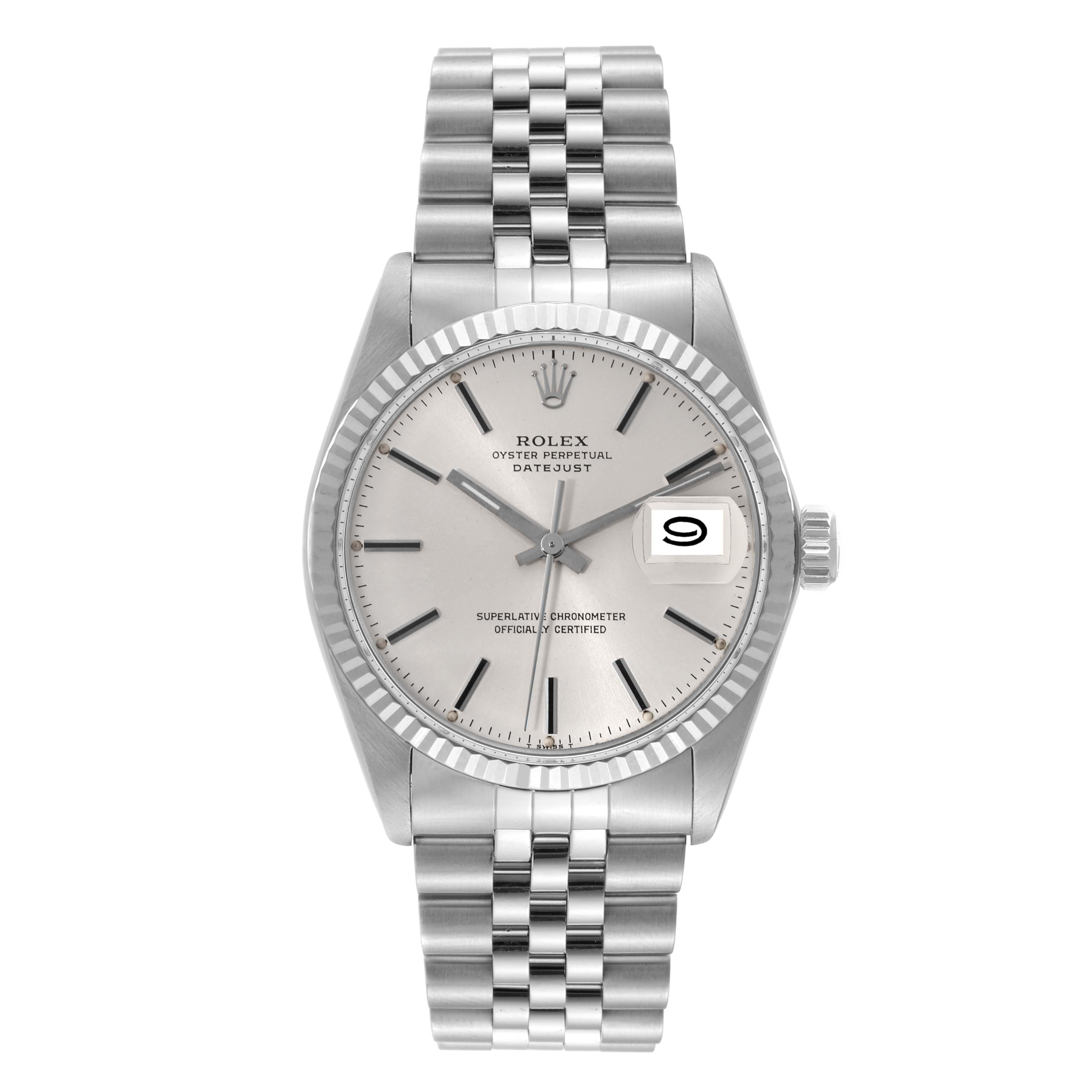 Rolex Datejust Steel White Gold Silver Dial Vintage Mens Watch 16014. Officially certified chronometer automatic self-winding movement. Stainless steel oyster case 36 mm in diameter. Rolex logo on the crown. 18k white gold fluted bezel. Acrylic