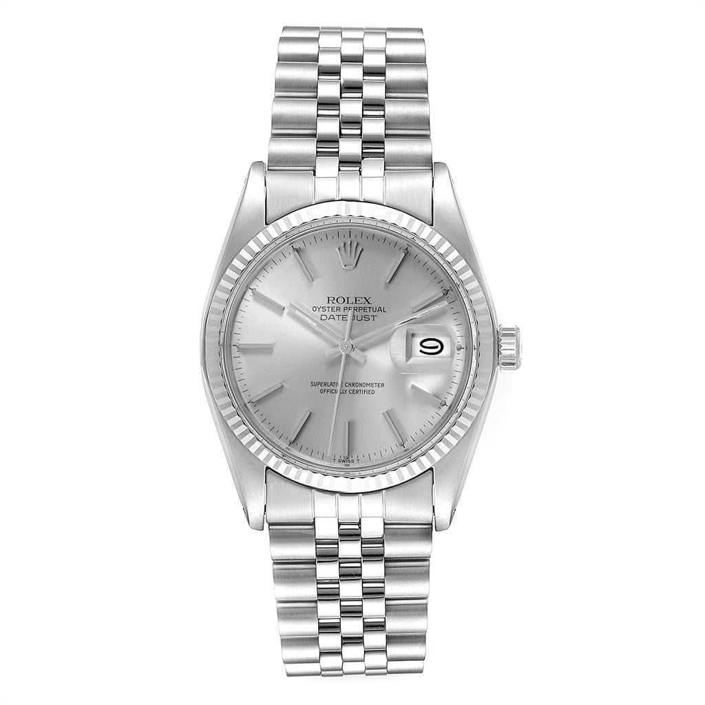 Rolex Datejust Steel White Gold Silver Dial Vintage Watch 16014 Box Papers. Officially certified chronometer self-winding movement. Stainless steel oyster case 36 mm in diameter. Rolex logo on a crown. 18k white gold fluted bezel. Acrylic crystal
