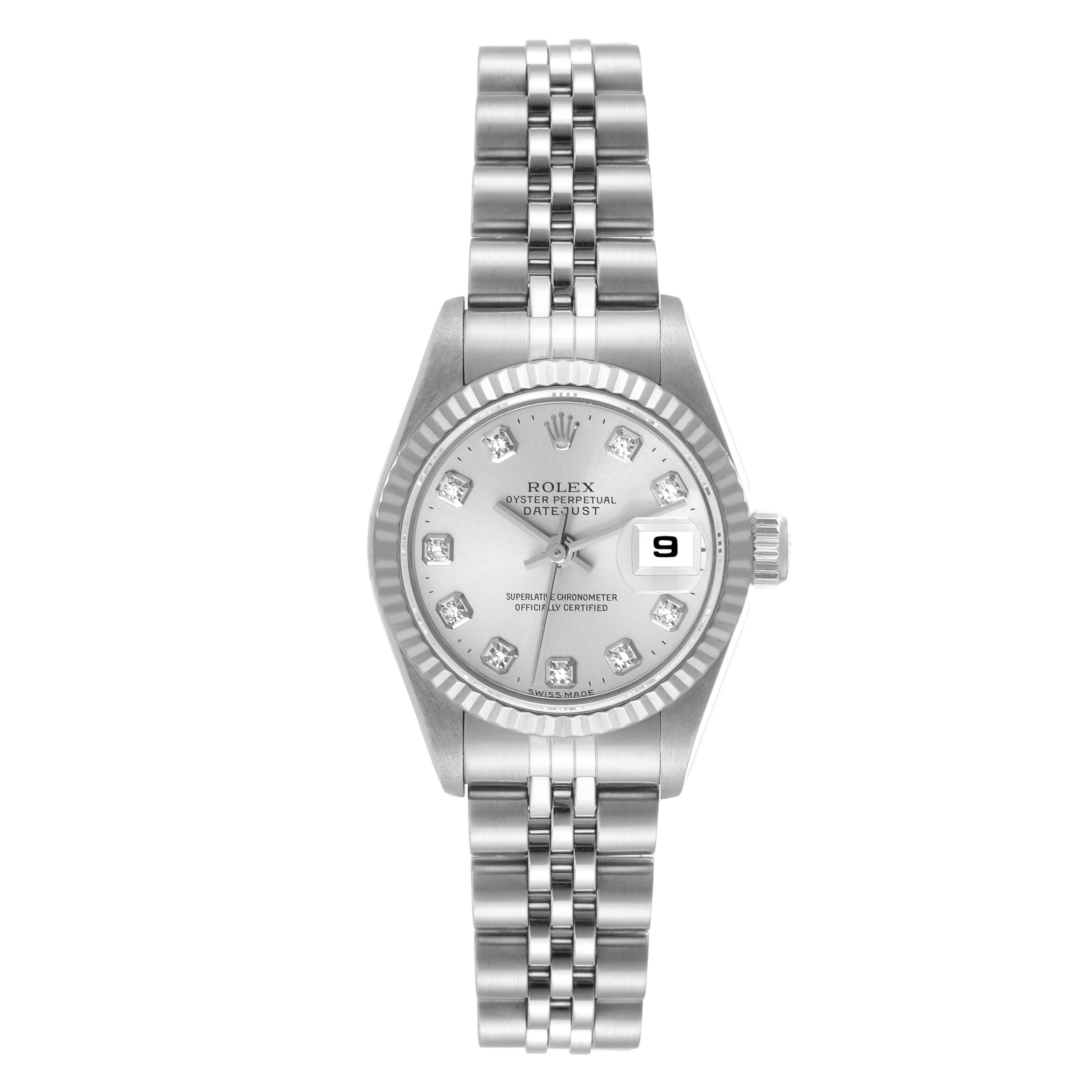 Rolex Datejust Steel White Gold Silver Diamond Dial Ladies Watch 69174. Officially certified chronometer self-winding movement. Stainless steel oyster case 26.0 mm in diameter. Rolex logo on a crown. 18k white gold fluted bezel. Scratch resistant
