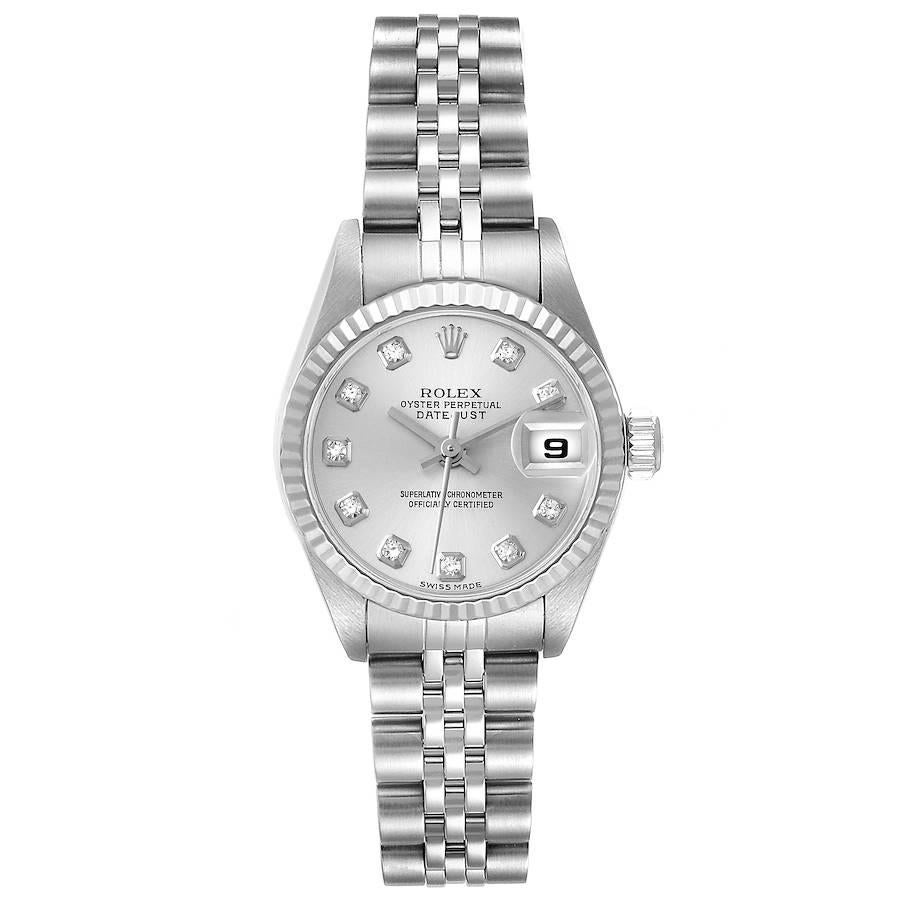 Rolex Datejust Steel White Gold Silver Diamond Dial Ladies Watch 79174. Officially certified chronometer self-winding movement. Stainless steel oyster case 26.0 mm in diameter. Rolex logo on a crown. 18K white gold fluted bezel. Scratch resistant