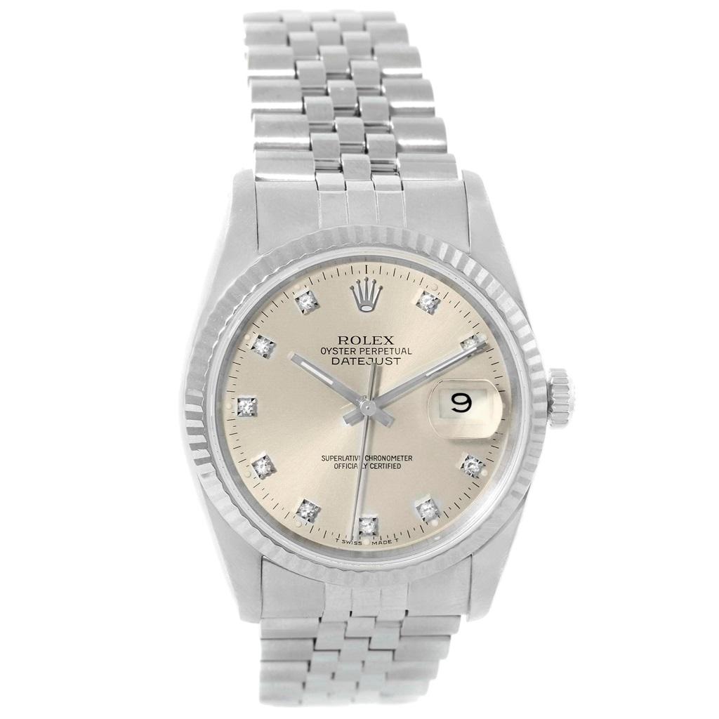 Rolex Datejust Steel White Gold Silver Diamond Dial Mens Watch 16234. Officially certified chronometer self-winding movement with quickset date function. Stainless steel oyster case 36.0 mm in diameter. Rolex logo on a crown. 18k white gold fluted