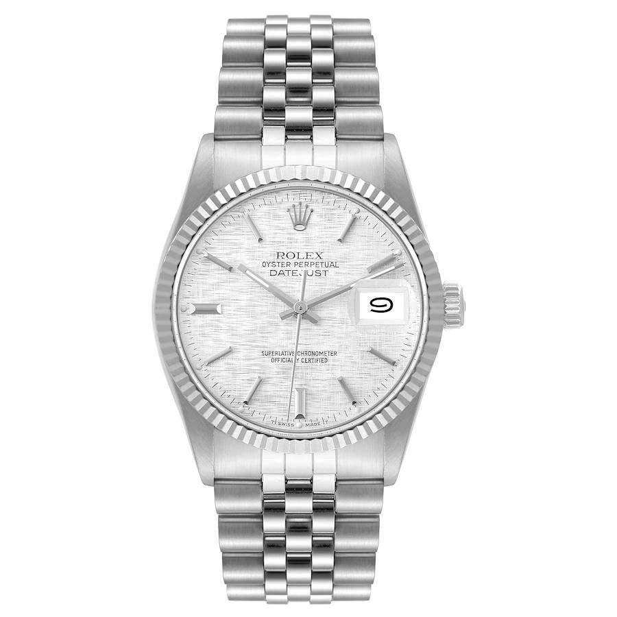 Rolex Datejust Steel White Gold Silver Linen Dial Vintage Mens Watch 16014. Officially certified chronometer automatic self-winding movement. Stainless steel oyster case 36 mm in diameter. Rolex logo on the crown. 18k white gold fluted bezel.