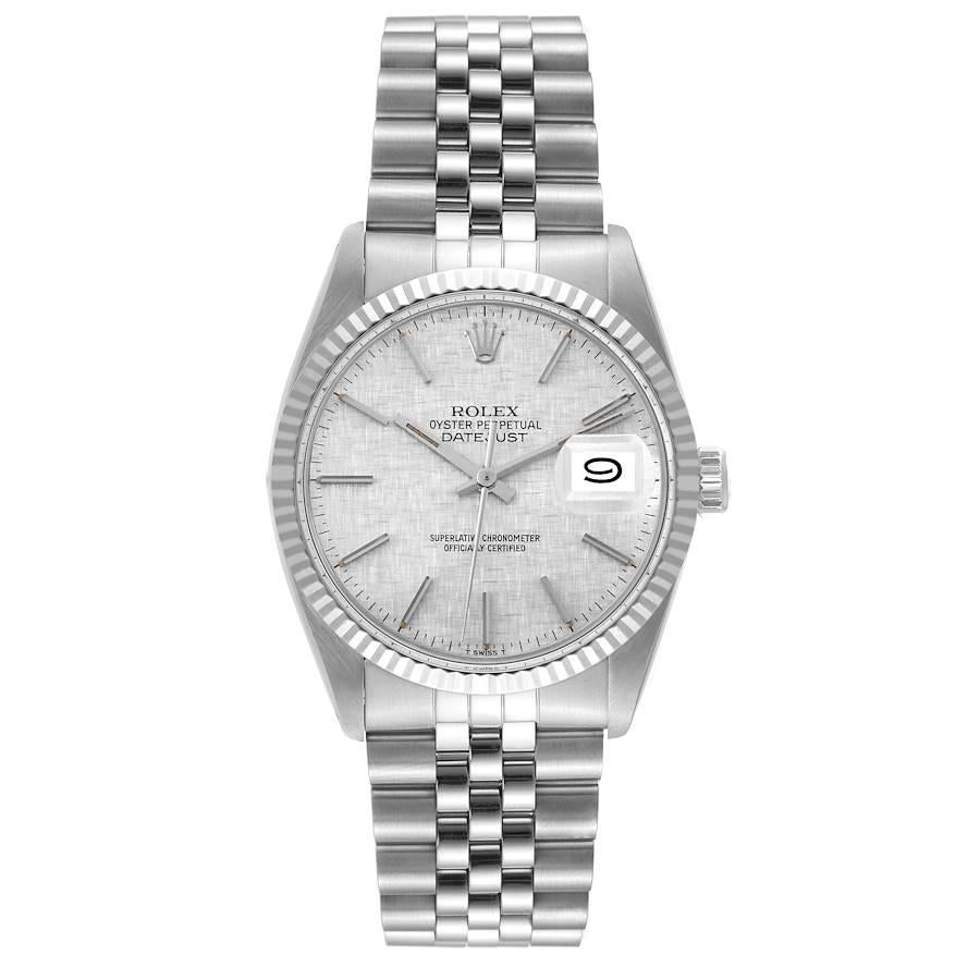 Rolex Datejust Steel White Gold Silver Linen Dial Vintage Mens Watch 16014. Officially certified chronometer automatic self-winding movement. Stainless steel oyster case 36 mm in diameter. Rolex logo on the crown. 18k white gold fluted bezel.