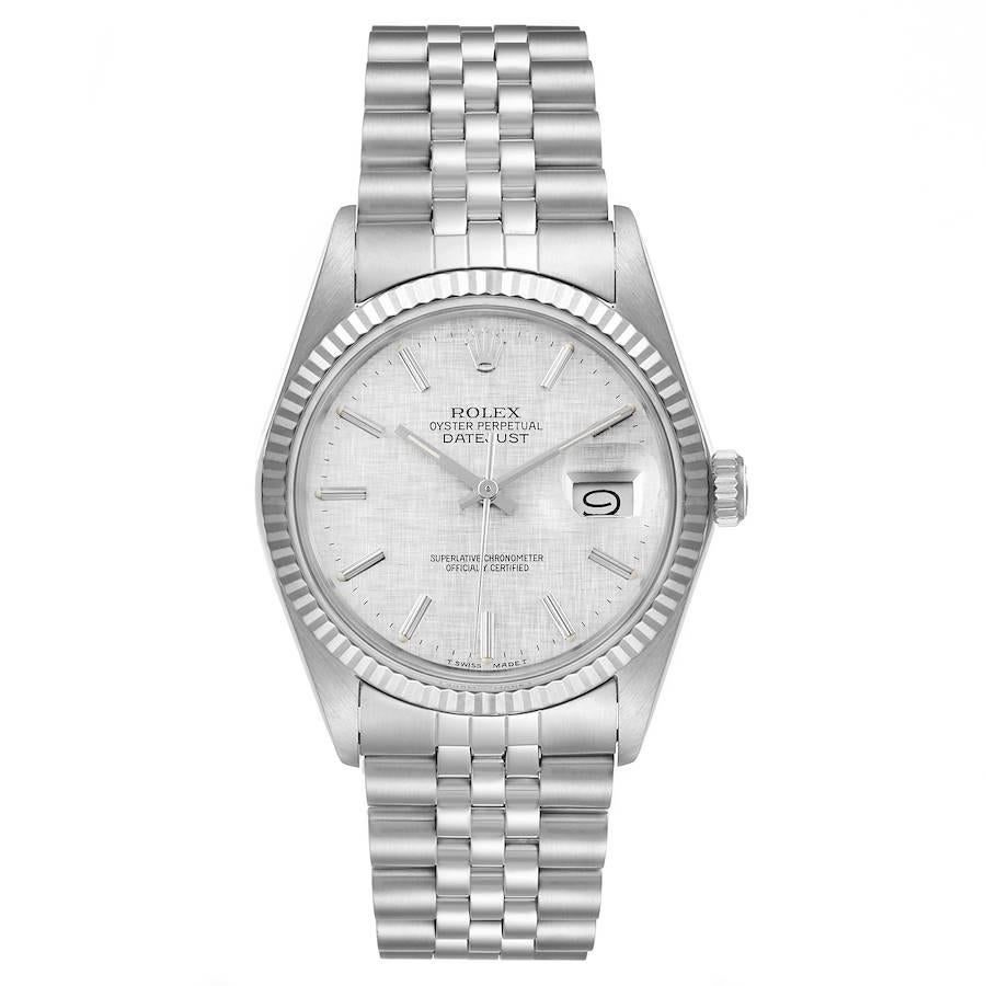 Rolex Datejust Steel White Gold Silver Linen Dial Vintage Watch 16014. Officially certified chronometer self-winding movement. Stainless steel oyster case 36 mm in diameter. Rolex logo on a crown. 18k white gold fluted bezel. Acrylic crystal with