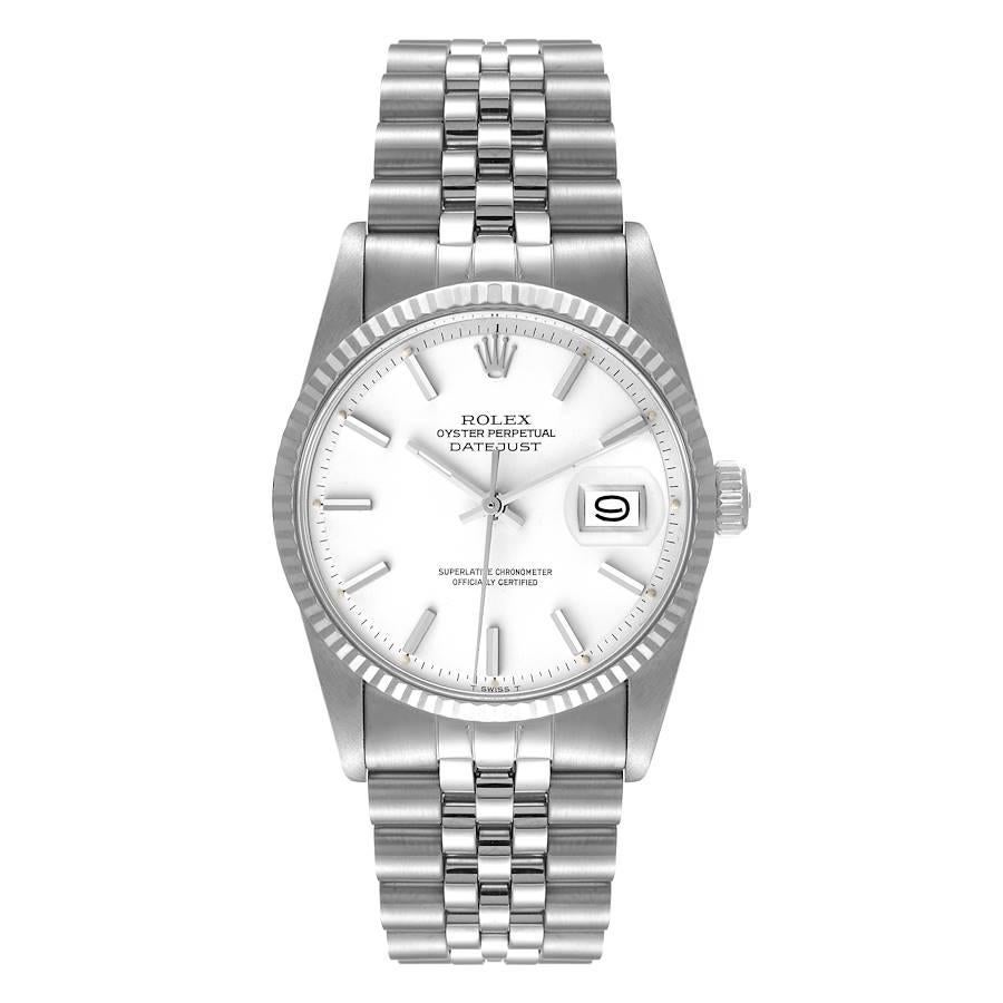 Rolex Datejust Steel White Gold White Dial Vintage Mens Watch 1601. Officially certified chronometer self-winding movement. Stainless steel oyster case 36 mm in diameter. Rolex logo on a crown. 18k white gold fluted bezel. Acrylic crystal with