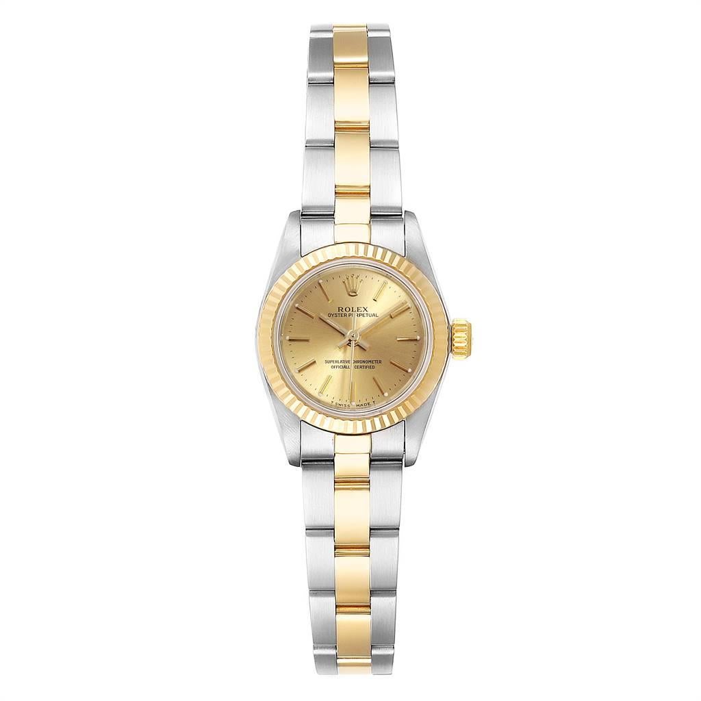 Rolex Datejust Steel Yellow Gold 26mm Ladies Ladies Watch 69173. Officially certified chronometer self-winding movement. Stainless steel oyster case 26.0 mm in diameter. Rolex logo on a crown. 18k yellow gold fluted bezel. Scratch resistant sapphire