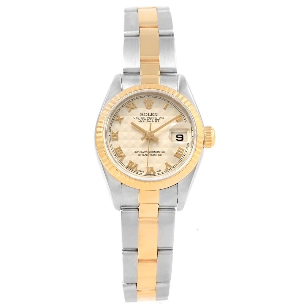 Rolex Datejust Steel Yellow Gold Anniversary Dial Ladies Watch 79173. Officially certified chronometer self-winding movement with quickset date function. Stainless steel oyster case 26.0 mm in diameter. Rolex logo on a 18K yellow gold crown. 18k