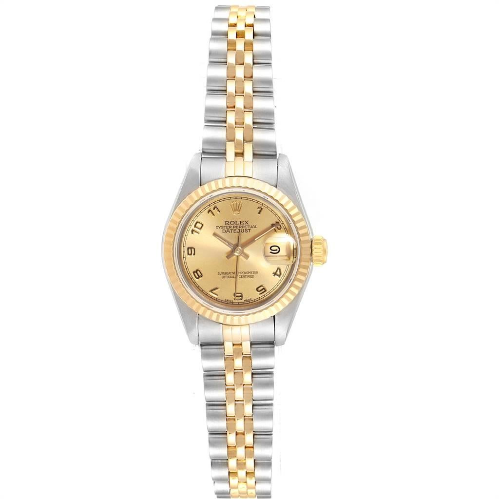 Rolex Datejust Steel Yellow Gold Arabic Numerals Ladies Ladies Watch 69173. Officially certified chronometer self-winding movement. Stainless steel oyster case 26.0 mm in diameter. Rolex logo on a crown. 18k yellow gold fluted bezel. Scratch