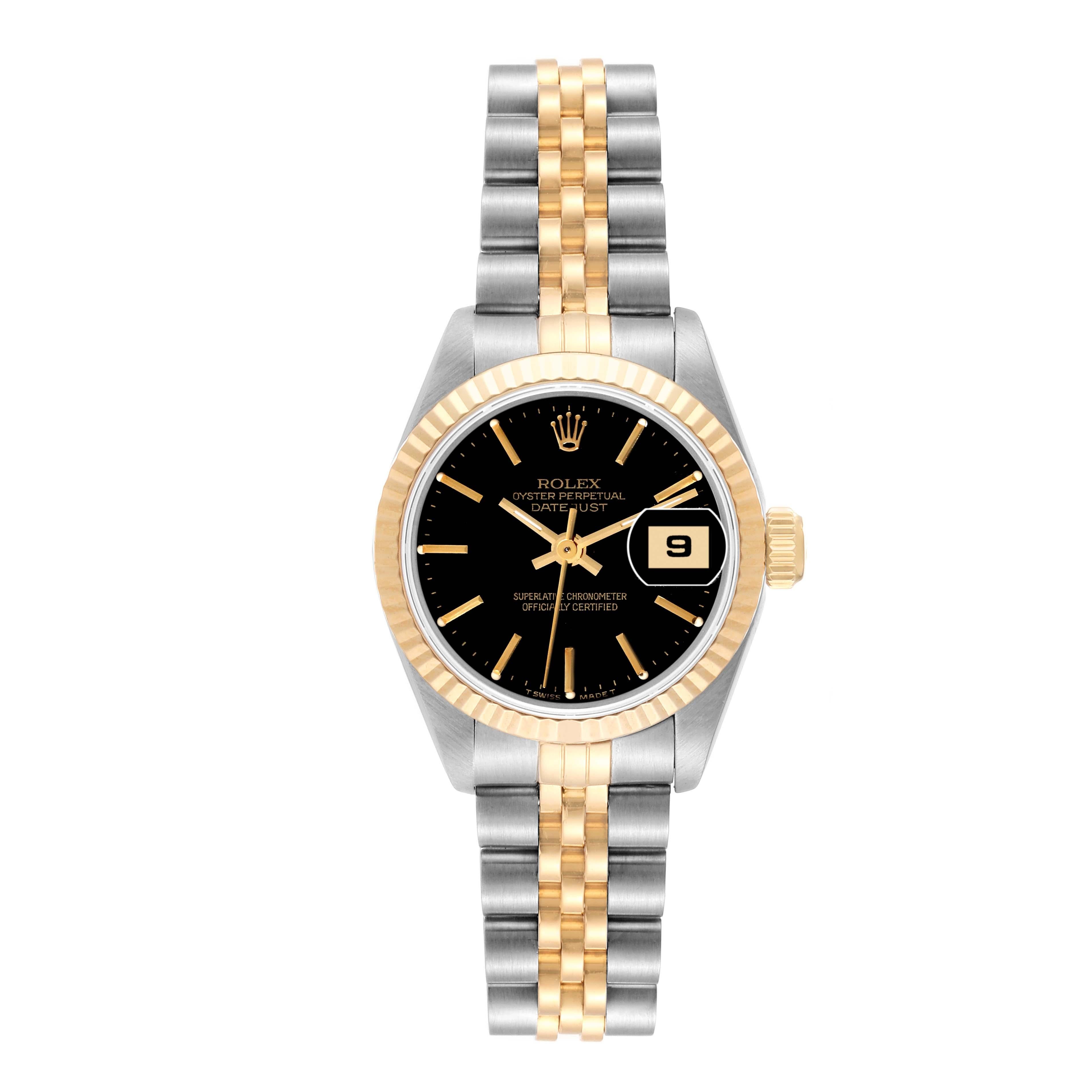 Rolex Datejust Steel Yellow Gold Black Dial Ladies Watch 69173. Officially certified chronometer automatic self-winding movement. Stainless steel oyster case 26.0 mm in diameter. Rolex logo on the crown. 18k yellow gold fluted bezel. Scratch