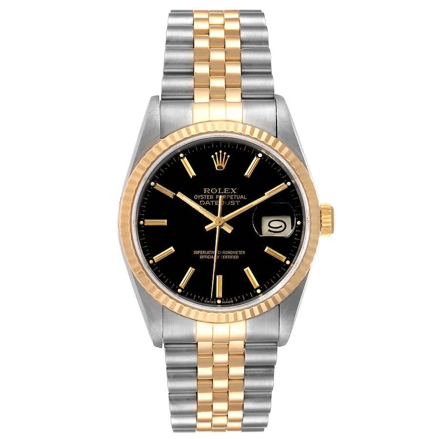 Rolex Datejust Steel Yellow Gold Black Dial Mens Watch 16233 Box. Officially certified chronometer self-winding movement. Stainless steel case 36 mm in diameter. Rolex logo on a 18K yellow gold crown. 18k yellow gold fluted bezel. Scratch resistant