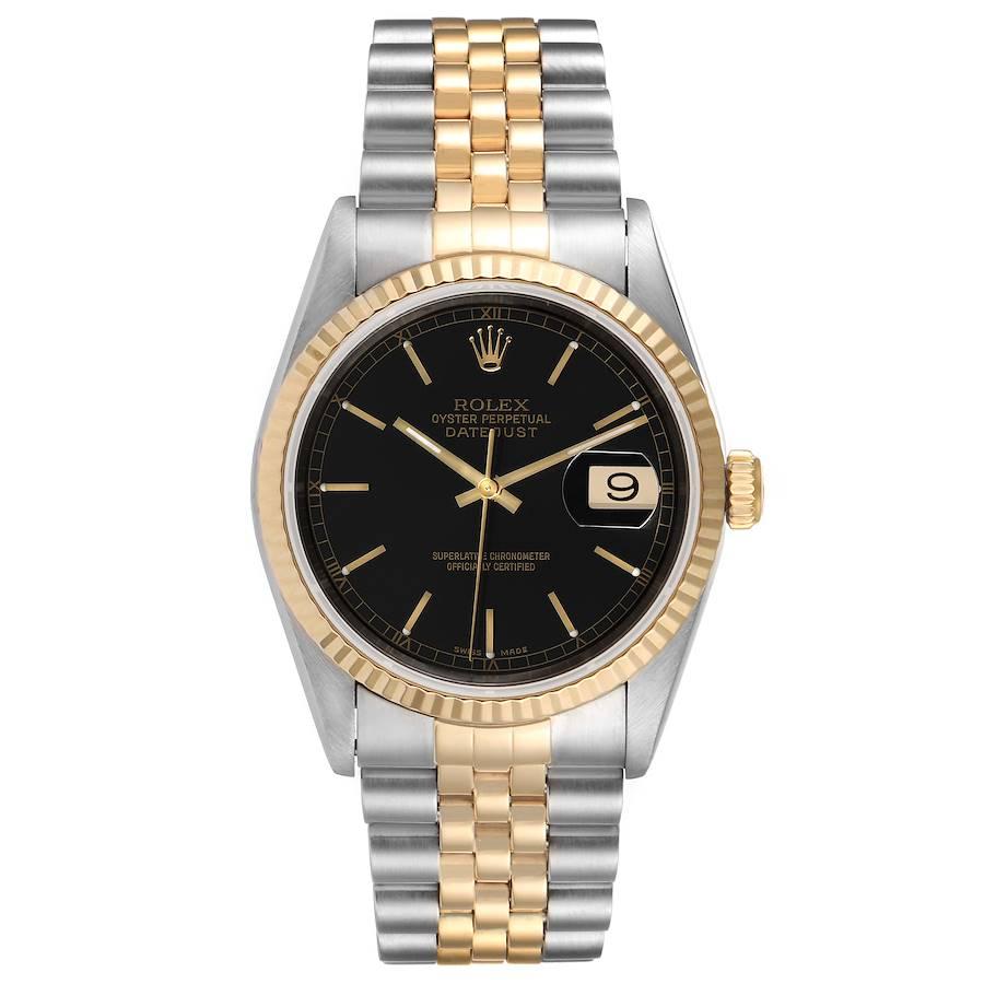 Rolex Datejust Steel Yellow Gold Black Dial Mens Watch 16233. Officially certified chronometer self-winding movement. Stainless steel case 36 mm in diameter.  Rolex logo on a 18K yellow gold crown. 18k yellow gold fluted bezel. Scratch resistant