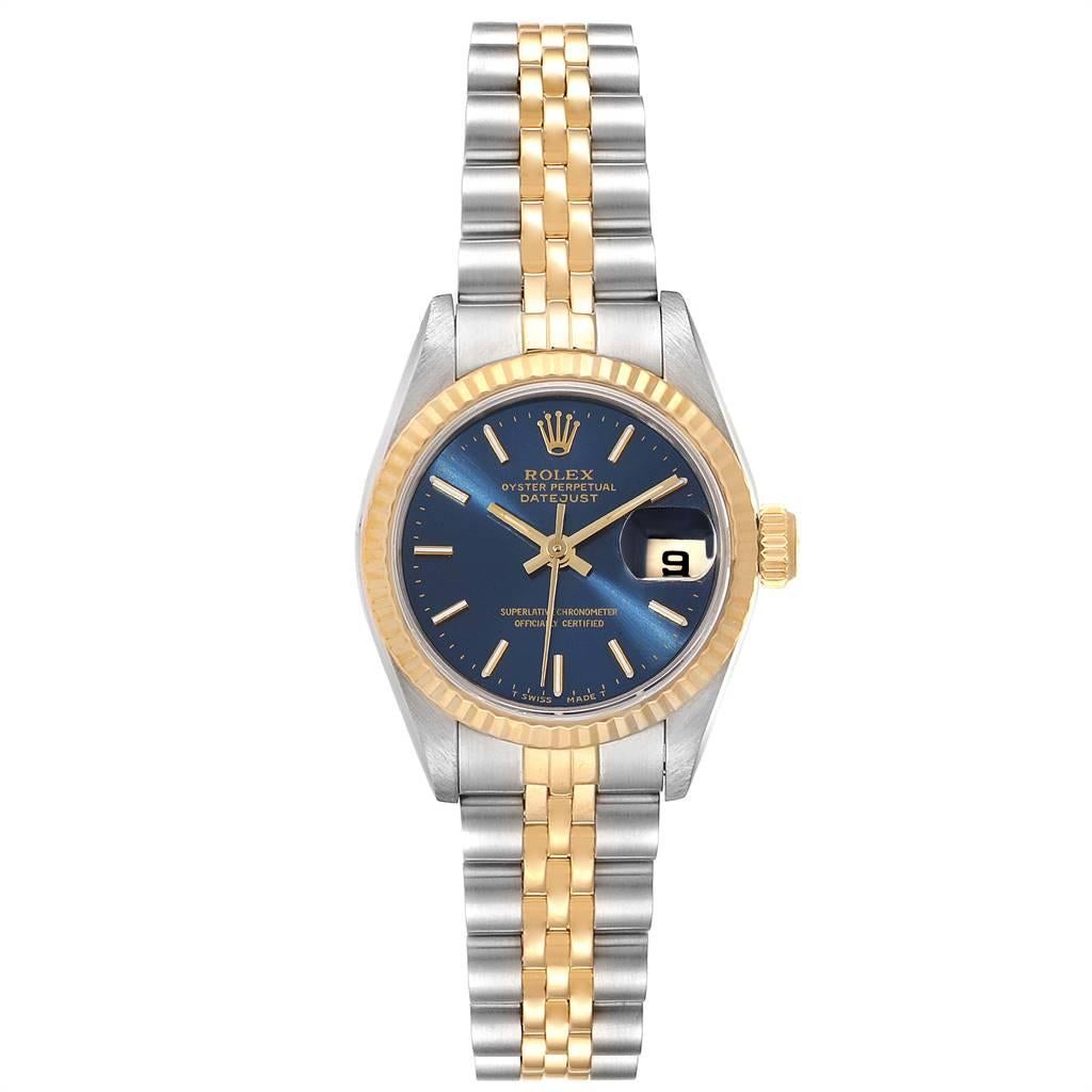 Rolex Datejust Steel Yellow Gold Blue Dial Ladies Watch 69173. Officially certified chronometer self-winding movement. Stainless steel oyster case 26 mm in diameter. Rolex logo on a crown. 18k yellow gold fluted bezel. Scratch resistant sapphire