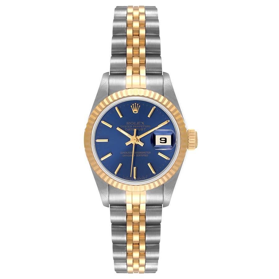 Rolex Datejust Steel Yellow Gold Blue Dial Ladies Watch 69173. Officially certified chronometer self-winding movement. Stainless steel oyster case 26.0 mm in diameter. Rolex logo on a crown. 18k yellow gold fluted bezel. Scratch resistant sapphire