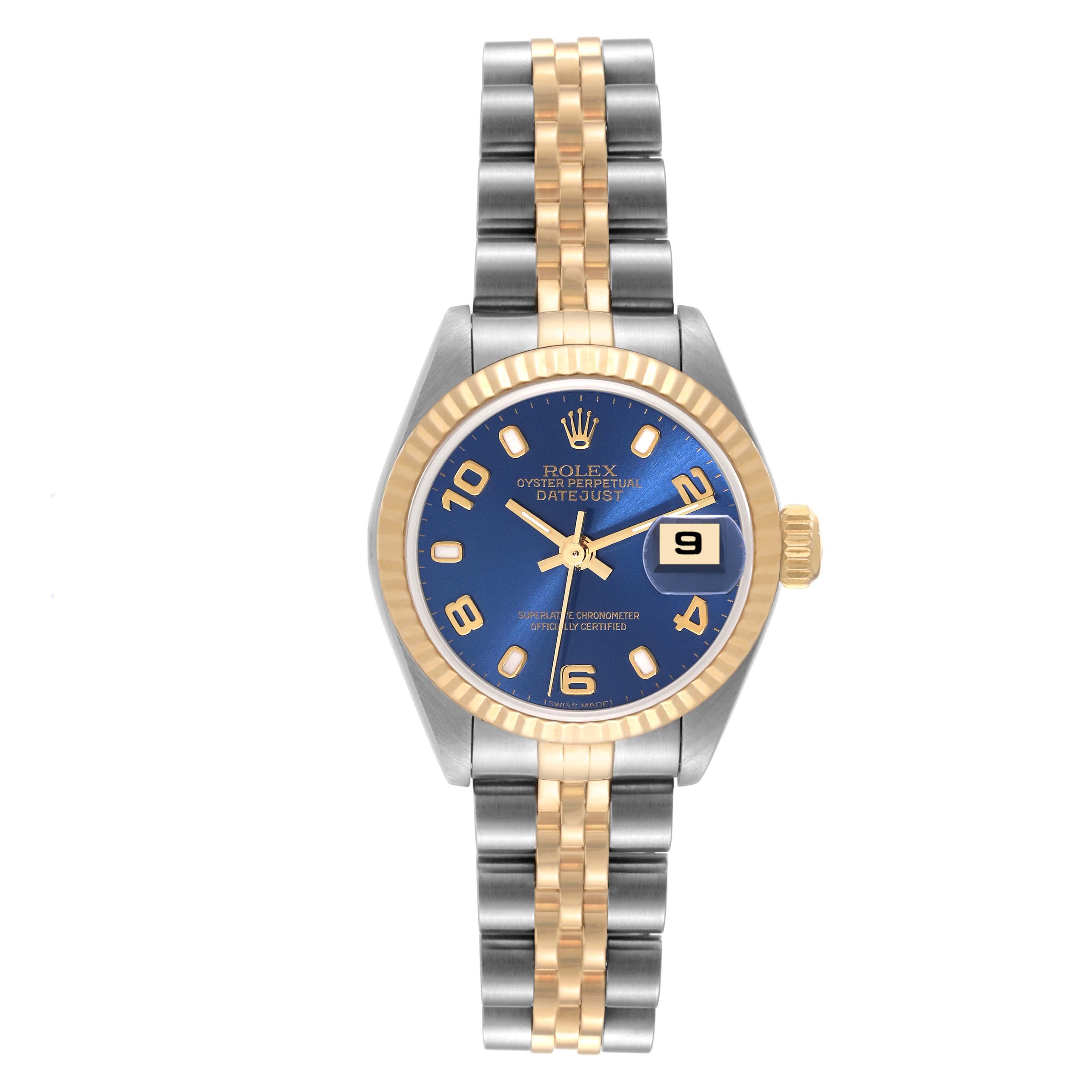 Rolex Datejust Steel Yellow Gold Blue Dial Ladies Watch 79173. Officially certified chronometer self-winding movement. Stainless steel oyster case 26.0 mm in diameter. Rolex logo on a 18K yellow gold crown. 18k yellow gold fluted bezel. Scratch