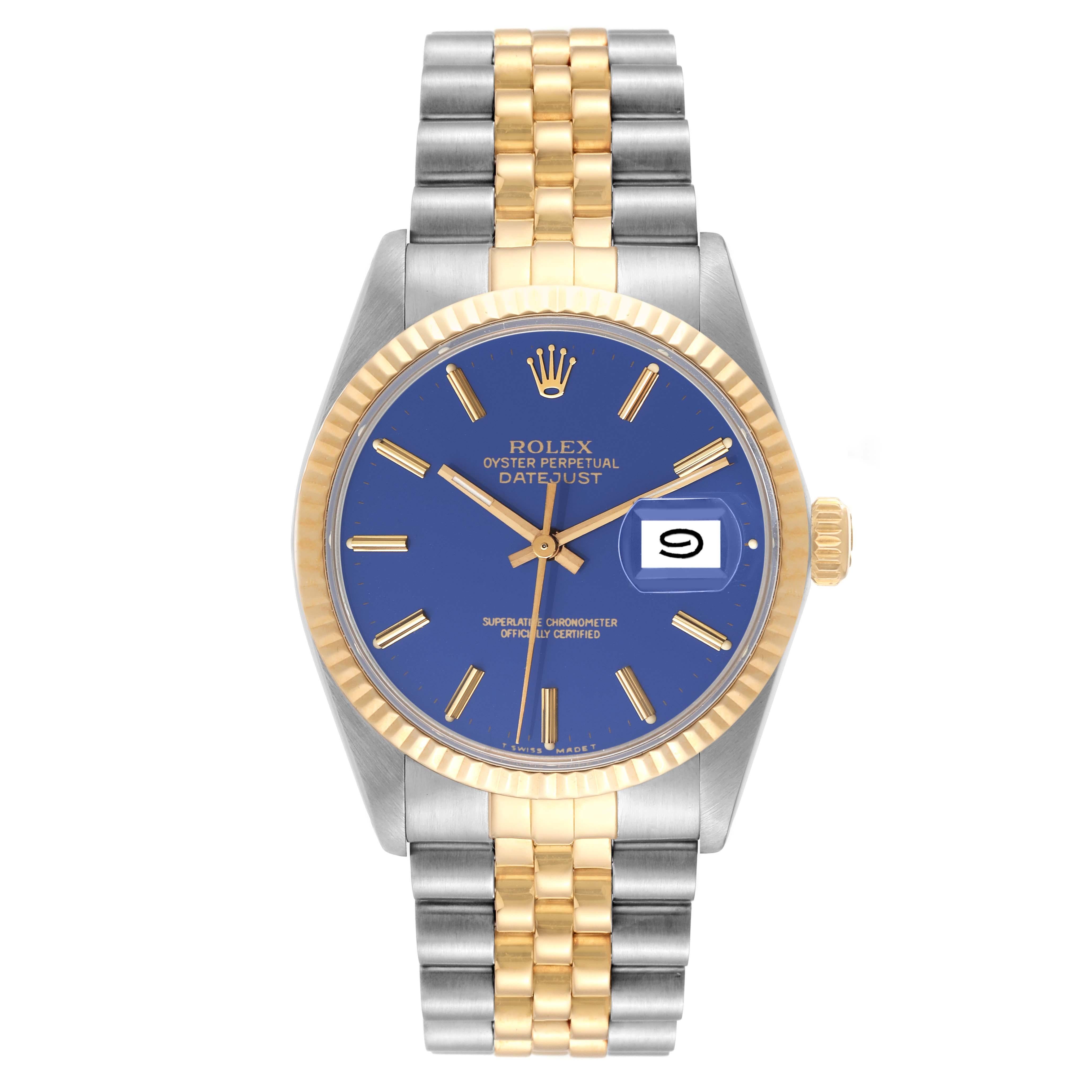 Rolex Datejust Steel Yellow Gold Blue Dial Vintage Mens Watch 16013 Box Papers. Officially certified chronometer automatic self-winding movement. Stainless steel and 18K yellow gold oyster case 36.0 mm in diameter. Rolex logo on an 18k yellow gold