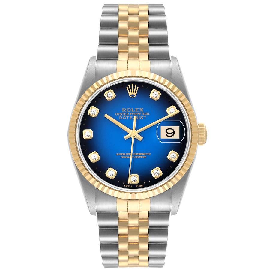 Rolex Datejust Steel Yellow Gold Blue Vignette Diamond Dial Mens Watch 16233. Officially certified chronometer automatic self-winding movement. Stainless steel case 36.0 mm in diameter.  Rolex logo on an 18K yellow gold crown. 18k yellow gold fluted