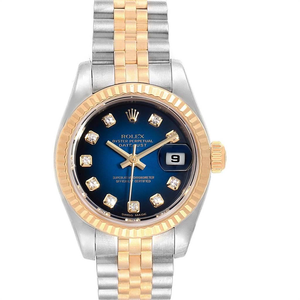 Rolex Datejust Steel Yellow Gold Blue Vignette Diamond Ladies Watch 179173. Officially certified chronometer self-winding movement. Stainless steel oyster case 26 mm in diameter. Rolex logo on a 18K yellow gold crown. 18k yellow gold fluted bezel.