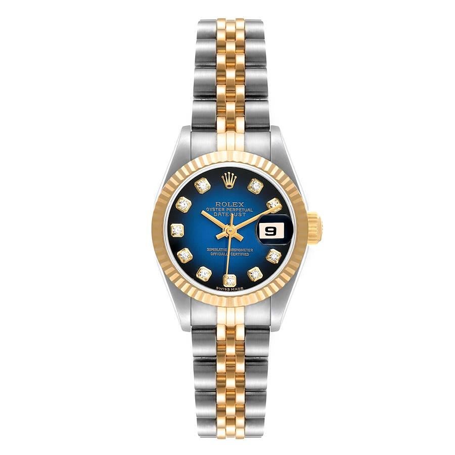 Rolex Datejust Steel Yellow Gold Blue Vignette Diamond Ladies Watch 79173. Officially certified chronometer self-winding movement. Stainless steel oyster case 26.0 mm in diameter. Rolex logo on a 18K yellow gold crown. 18k yellow gold fluted bezel.