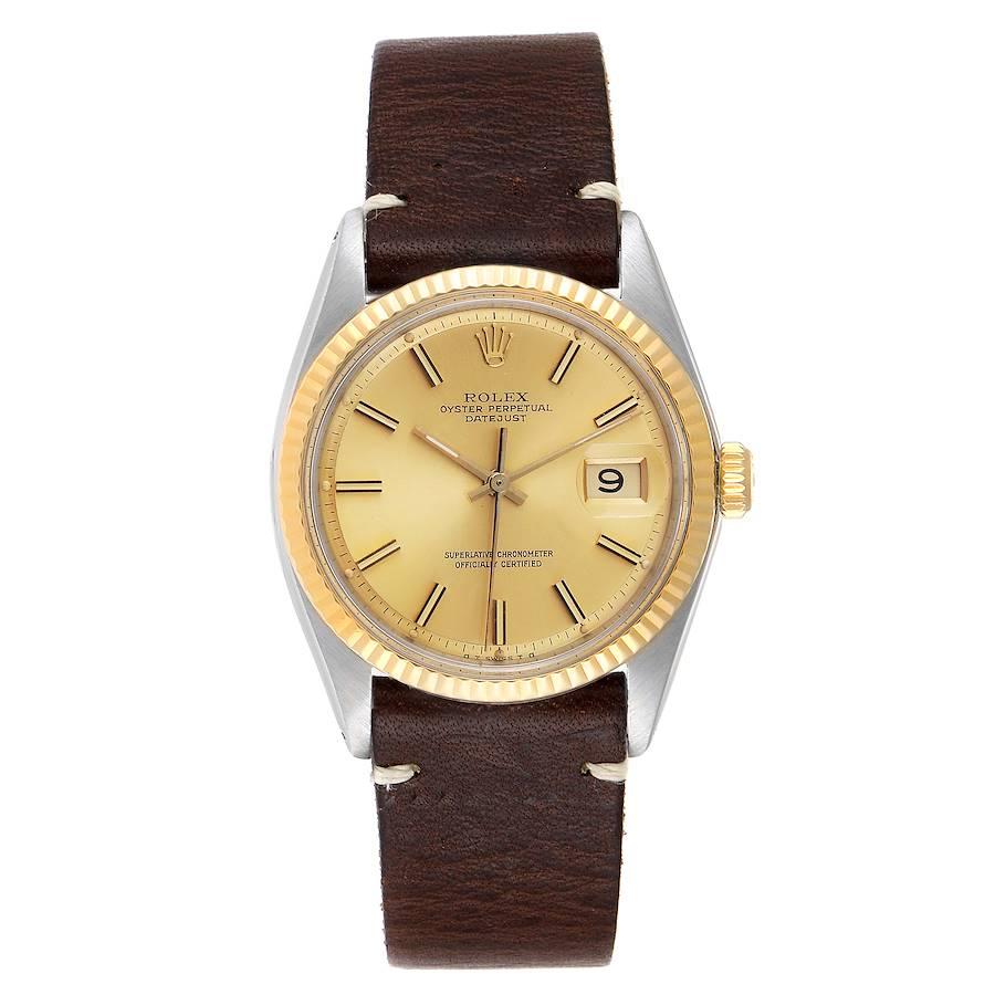 Rolex Datejust Steel Yellow Gold Brown Strap Vintage Mens Watch 1601. Officially certified chronometer automatic self-winding movement. Stainless steel and 14k yellow gold case 34 mm in diameter. Rolex logo on a crown. 14k yellow gold fluted bezel.
