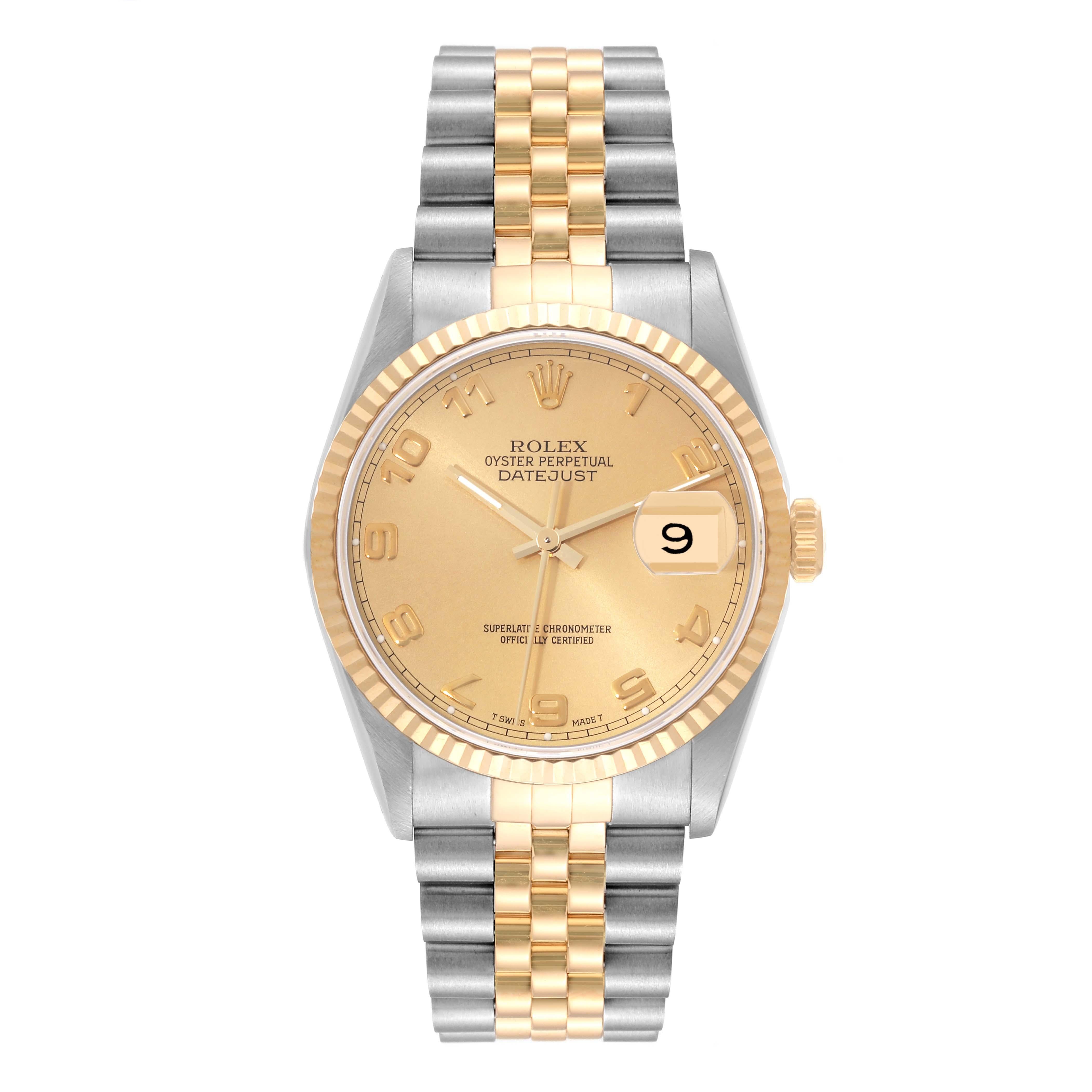Rolex Datejust Steel Yellow Gold Champagne Arabic Dial Watch 16233 Box Papers. Officially certified chronometer automatic self-winding movement. Stainless steel case 36.0 mm in diameter. Rolex logo on a crown. 18k yellow gold fluted bezel. Scratch