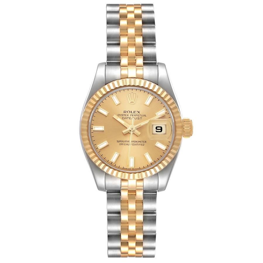 Rolex Datejust Steel Yellow Gold Champagne Dial Ladies Watch 179173. Officially certified chronometer automatic self-winding movement. Stainless steel oyster case 26.0 mm in diameter. Rolex logo on an 18K yellow gold crown. 18k yellow gold fluted