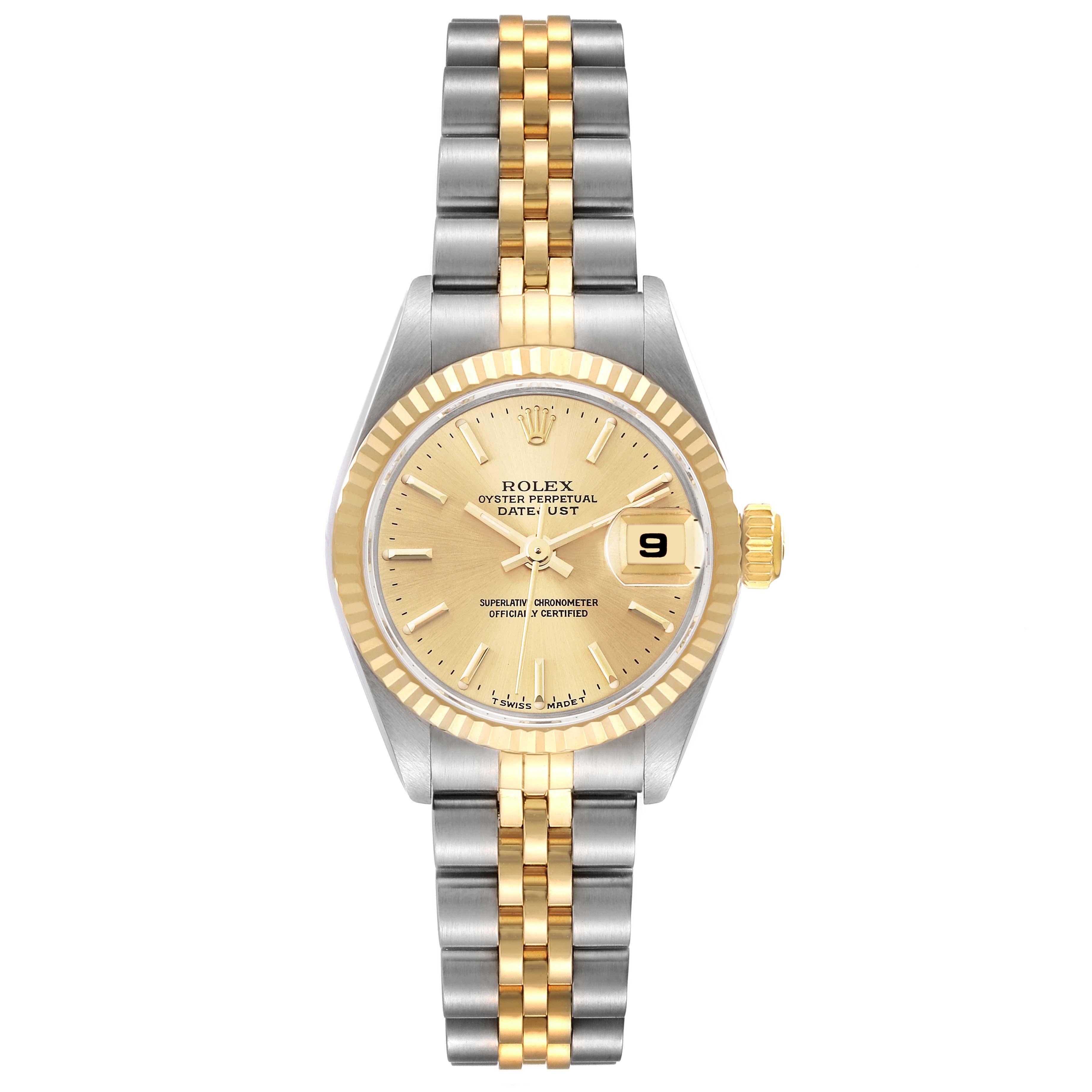Rolex Datejust Steel Yellow Gold Champagne Dial Ladies Watch 69173. Officially certified chronometer automatic self-winding movement. Stainless steel oyster case 26.0 mm in diameter. Rolex logo on the crown. 18k yellow gold fluted bezel. Scratch