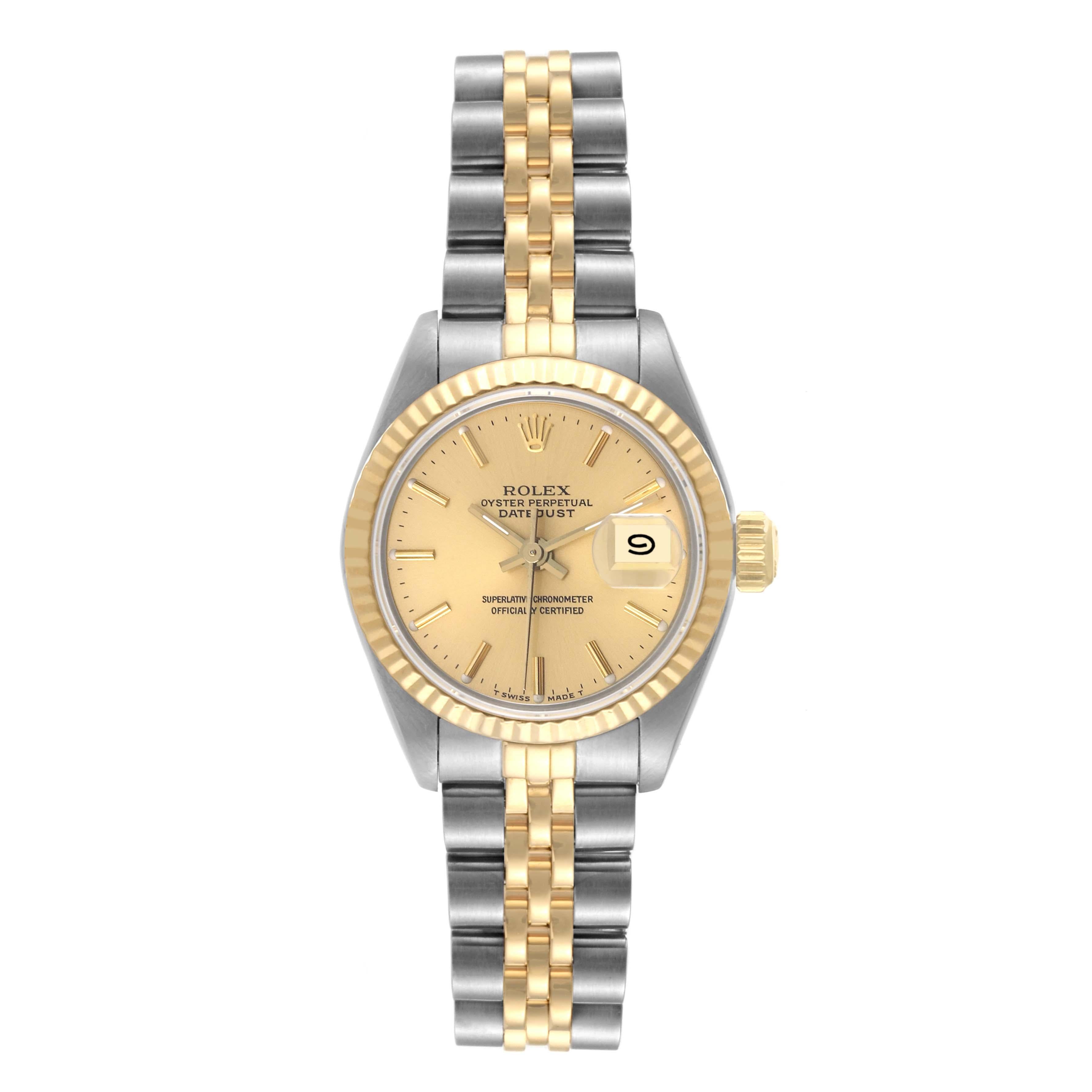 Rolex Datejust Steel Yellow Gold Champagne Dial Ladies Watch 69173. Officially certified chronometer automatic self-winding movement. Stainless steel oyster case 26.0 mm in diameter. Rolex logo on the crown. 18k yellow gold fluted bezel. Scratch